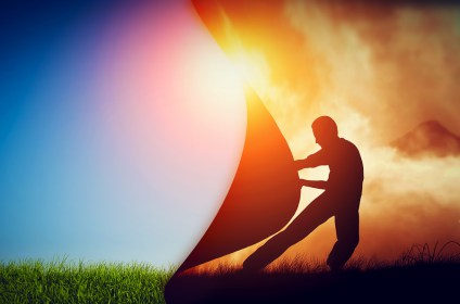 Man pulling curtain of darkness to reveal a new better world. Co